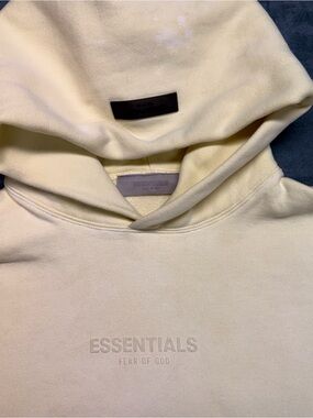 Essentials Hooded Sweatshirt in Pale Yellow with Subtle Logo